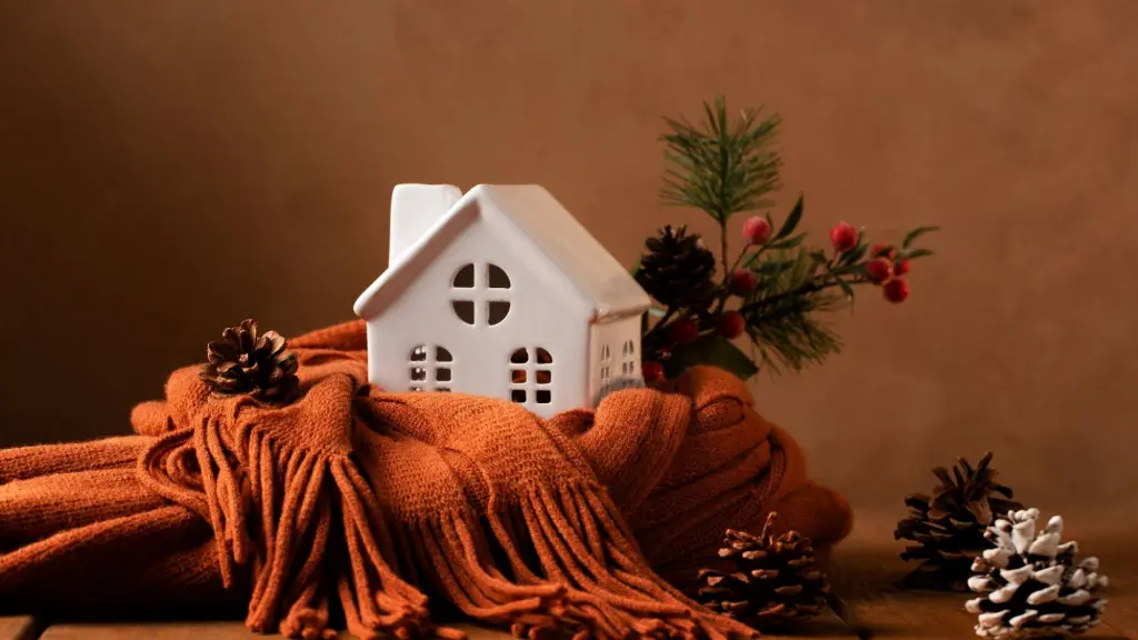 Thanksgiving cozy decor with earthy tones and mini porcelain house