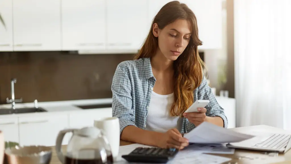 Woman in the kitchen planning for Black Friday